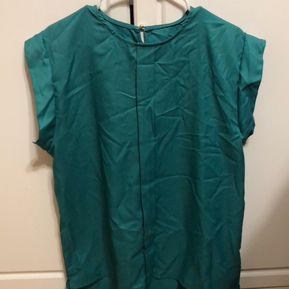Green women’s blouse. Perfect for work.